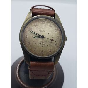 Select women's watch. Large face, Small leaves on watch face.